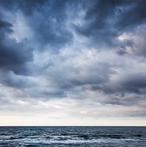 the sea with a cloudy sky