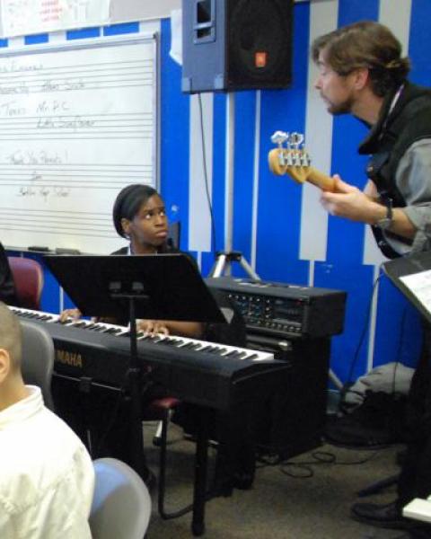 Teacher in a music class