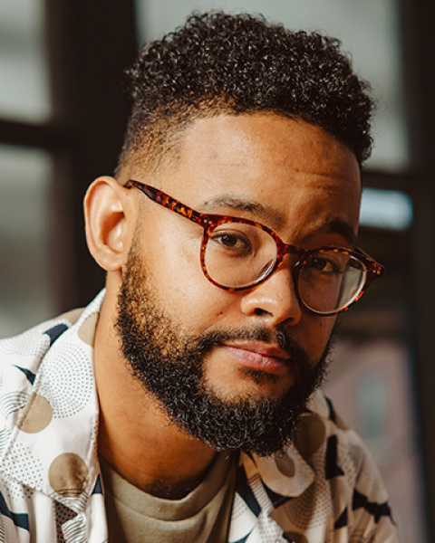 Miguel Landestoy smiling.