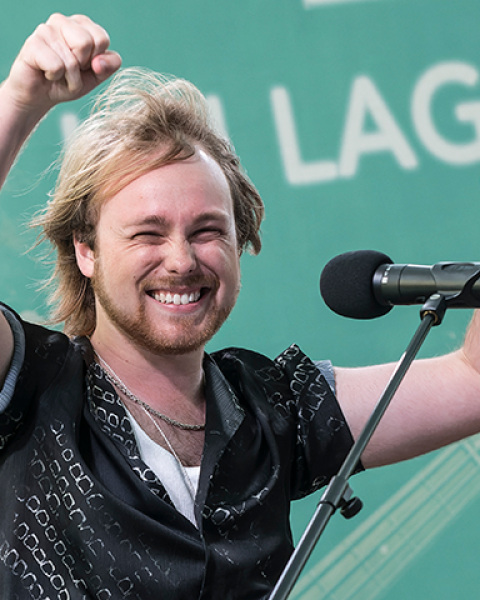 Brad Belmondo performs on stage