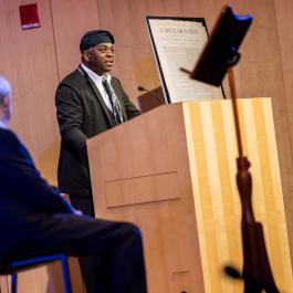 Regie Gibson, assistant professor and inaugural Massachusetts poet laureate, with US Supreme Court Justice Stephen Breyer (left) at We Hold These Truths on June 25, 2026.