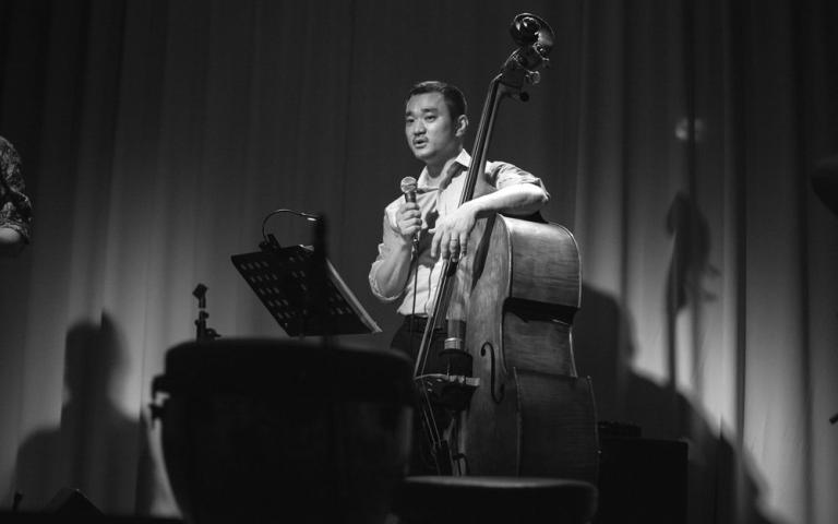 Ray Seol on stage with his double bass