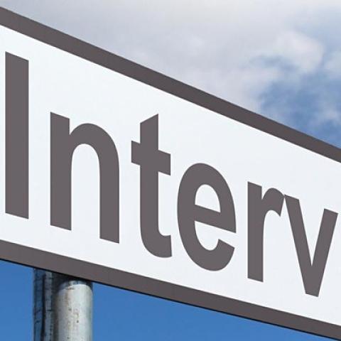 sign post that reads interview
