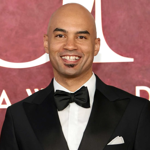 Photo of Nicholas Christopger in a tux on the Tony's red carpet