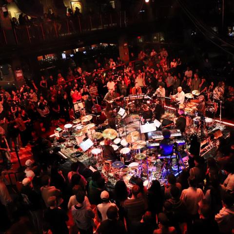 A band on stage at the House of Blues