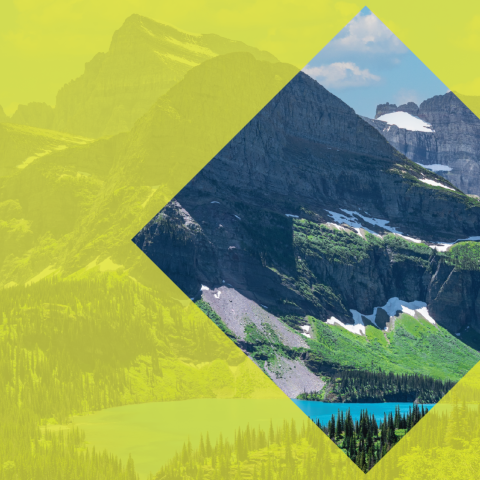 Image of a mountain with a yellow-green film over the image, excluding a diamond shaped opening 