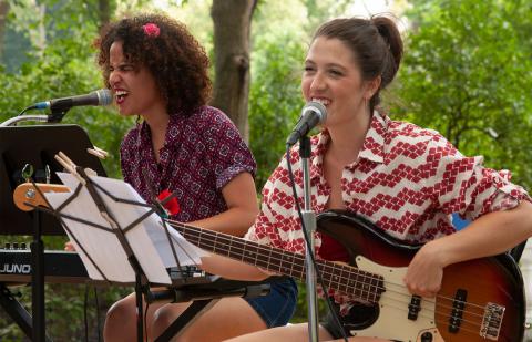 Students in a summer program performing outside