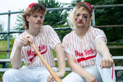 Members of the band Mom Rock pose in vintage baseball gear