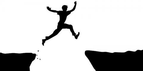 picture of a person jumping over a gap