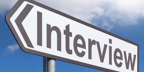 sign post that reads interview