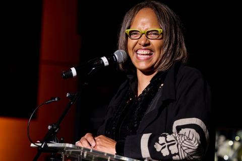 Terri Lyne Carrington giving remarks at the honorary doctorate event for Joni Mitchell