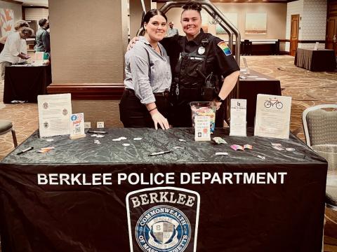 Officer Kate Chuilli and her fiance, Mallory, at a table event