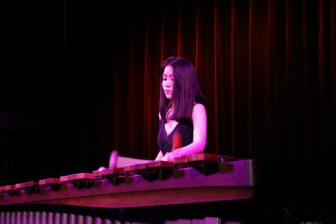 Xingyao Xue playing marimba on stage 