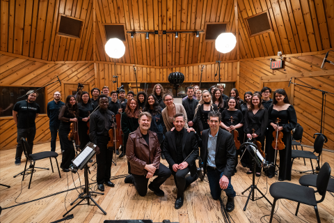 Berklee NYC's executive director Stephen Webber (front left), Matthew Marsit (front center), and Sean McMahon (front right) pose with students and Power Station studio staff members.