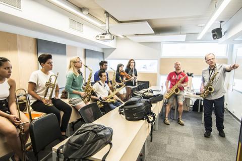 Allen Chase leads students in musicianship class.