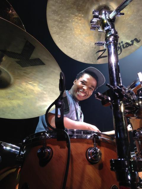 Lumanyano Mzi behind a drum kit