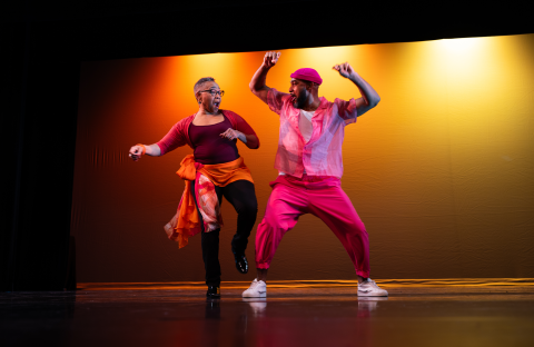 Karen Bell (left) and Anthony Burrell (right) share a moment in their routine, “W.O.M.A.N.”