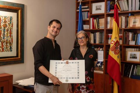 Mirza Redzepagic MM ’23 receives the Order of Civil Merit presented by H.E. Teresa Lizaranzu.