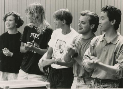 Students clapping during ear training class in 1989 summer program