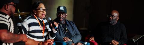 Four people sitting for a Career Jam panel discussion