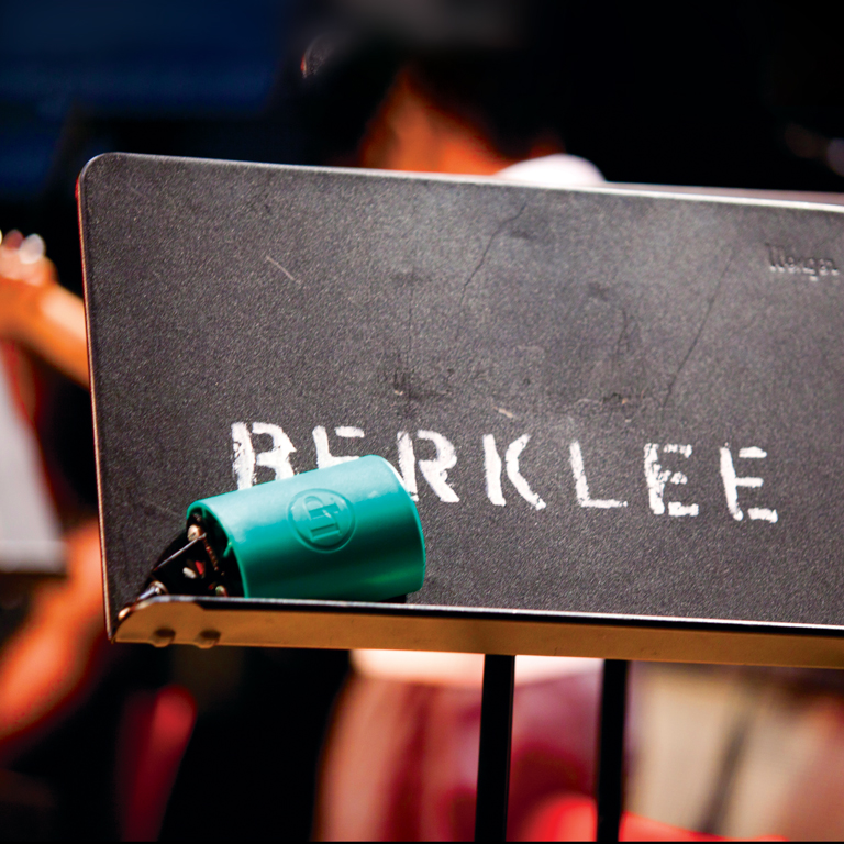 A music sheet stand with Berklee written on it